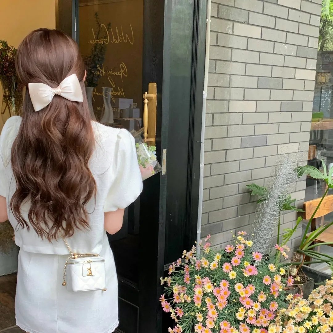 彼女